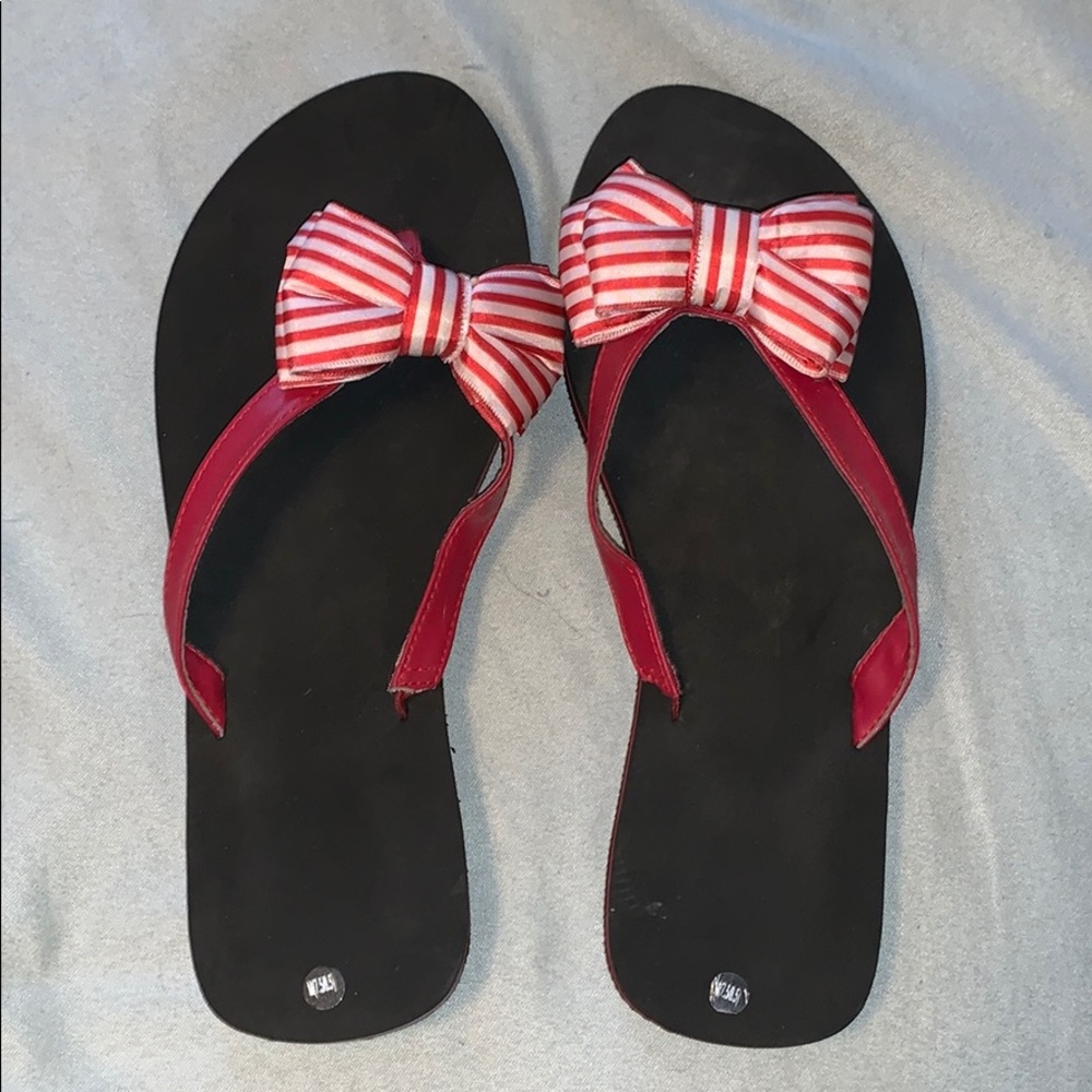 Red and black flip flops